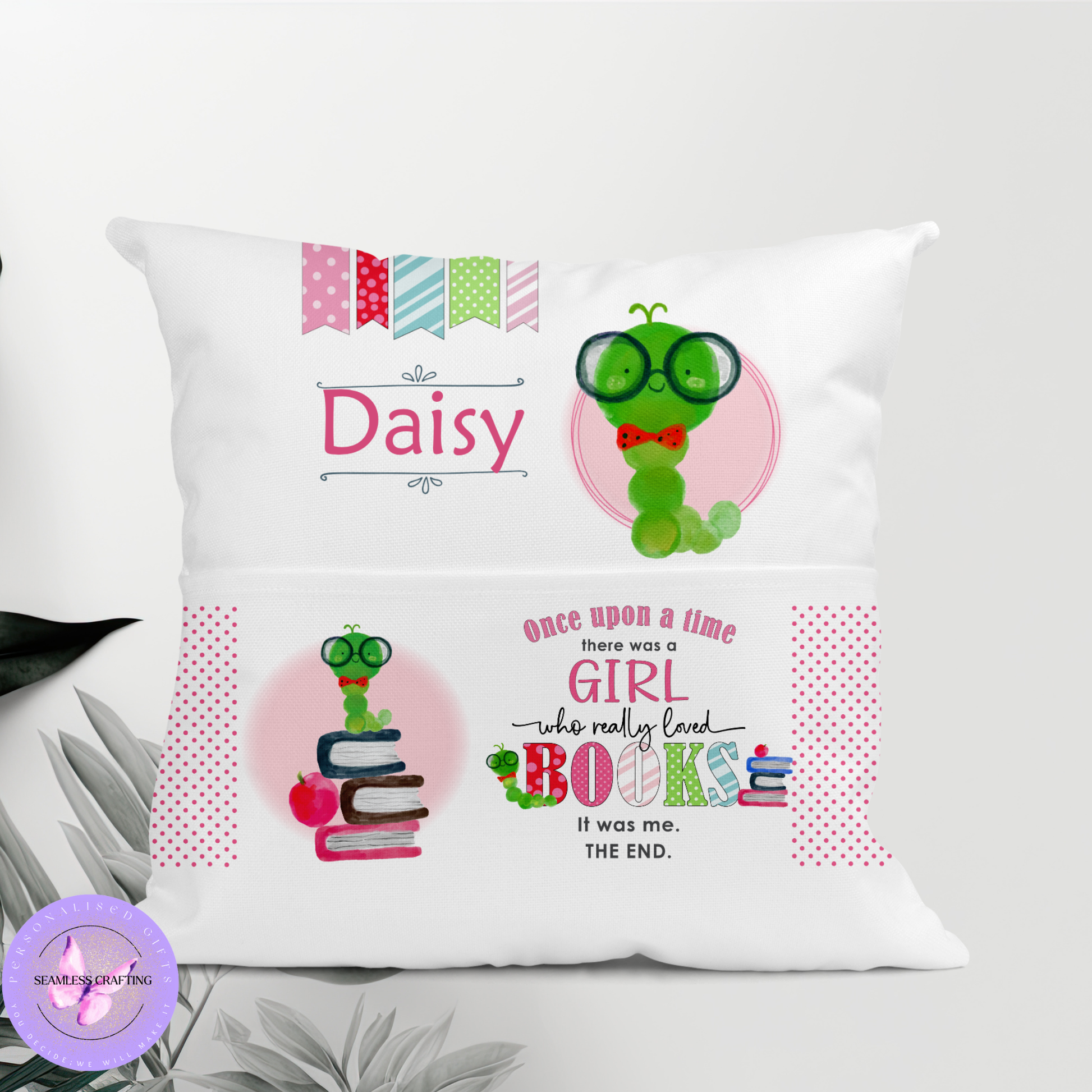 Personalised bookworm reading cushion for girls with name and book pocket, pink caterpillar design