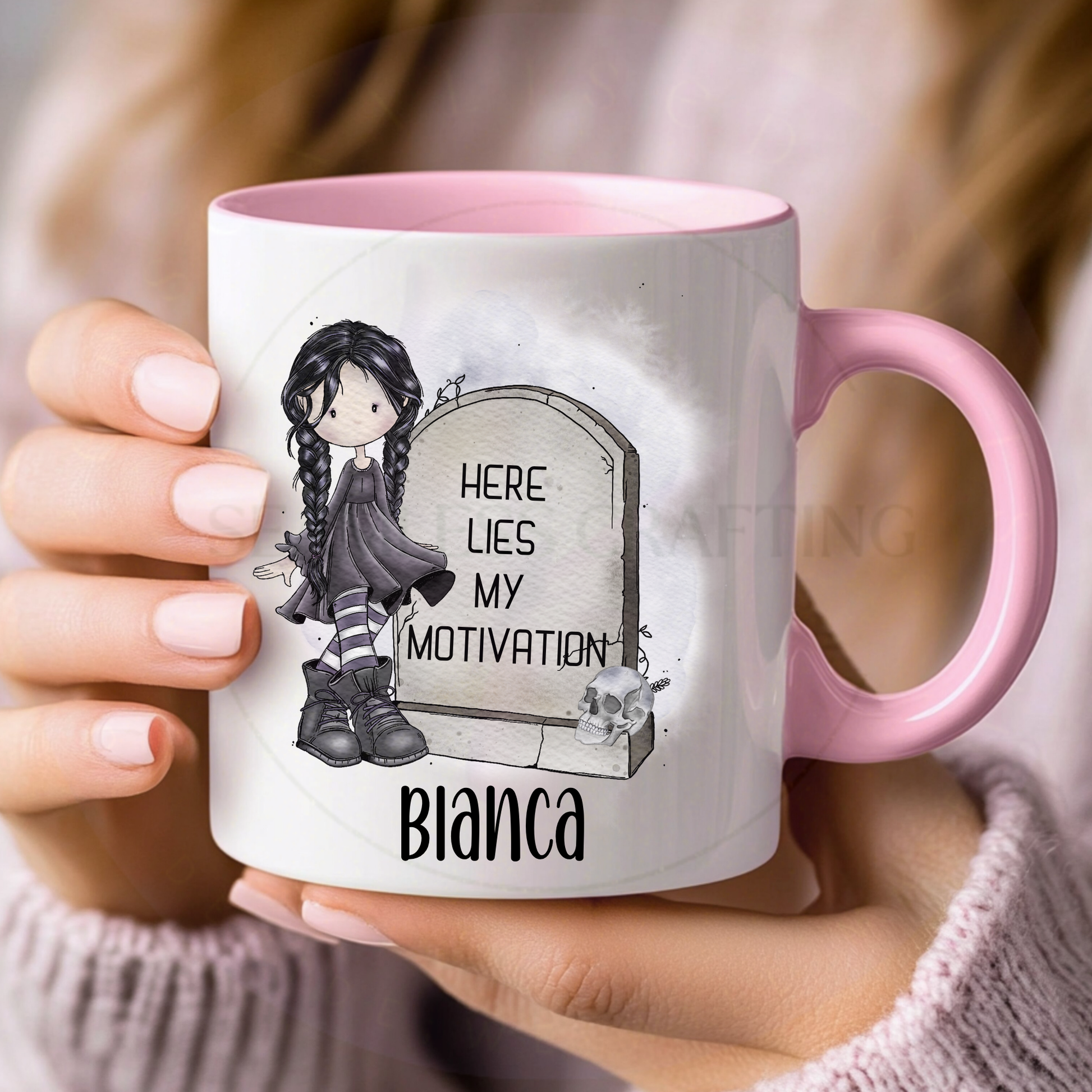 Pink handle personalised spooky mug with gothic girl illustration, skull detail and Here Lies My Motivation quote