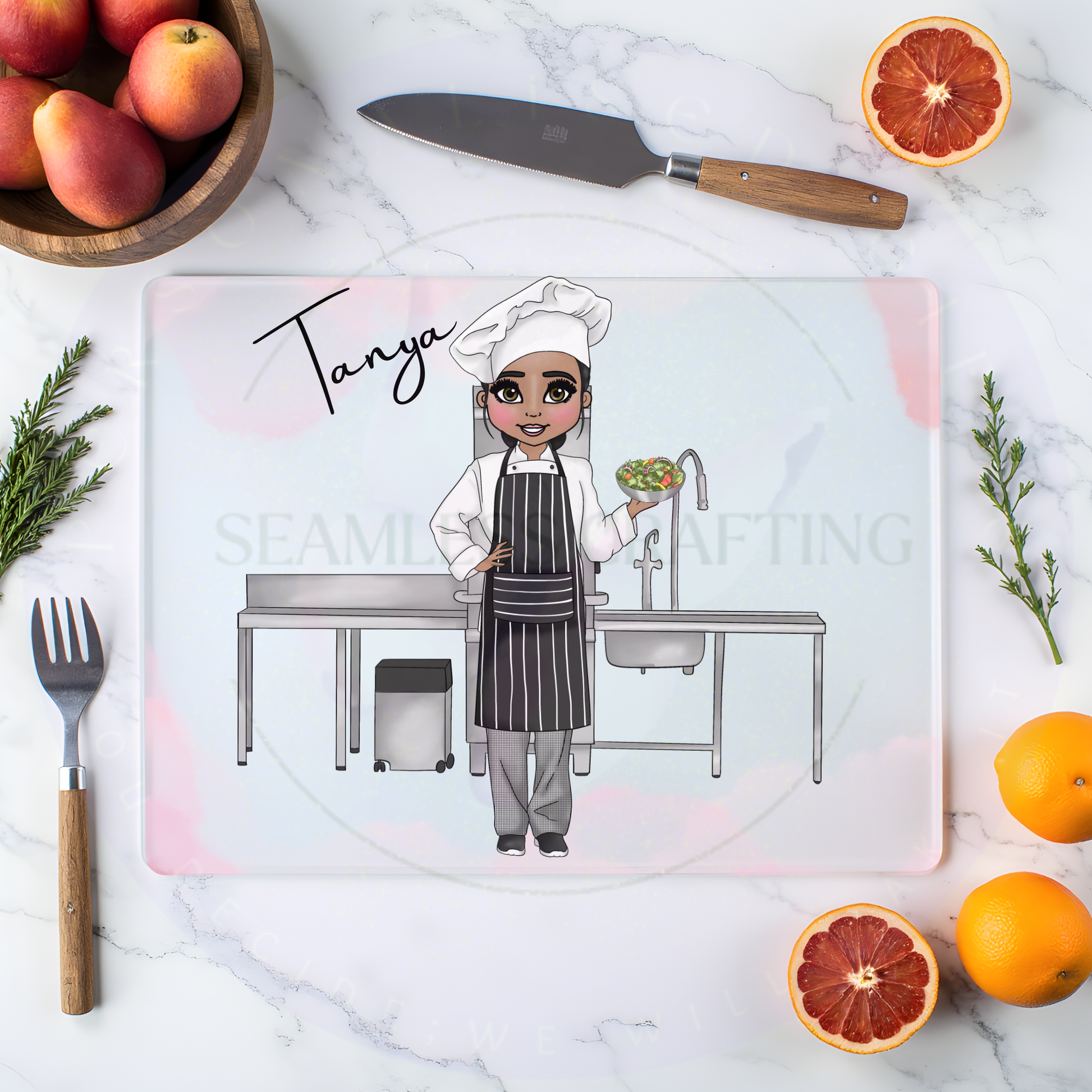 Personalised chef glass chopping board with Tanya name on kitchen worktop