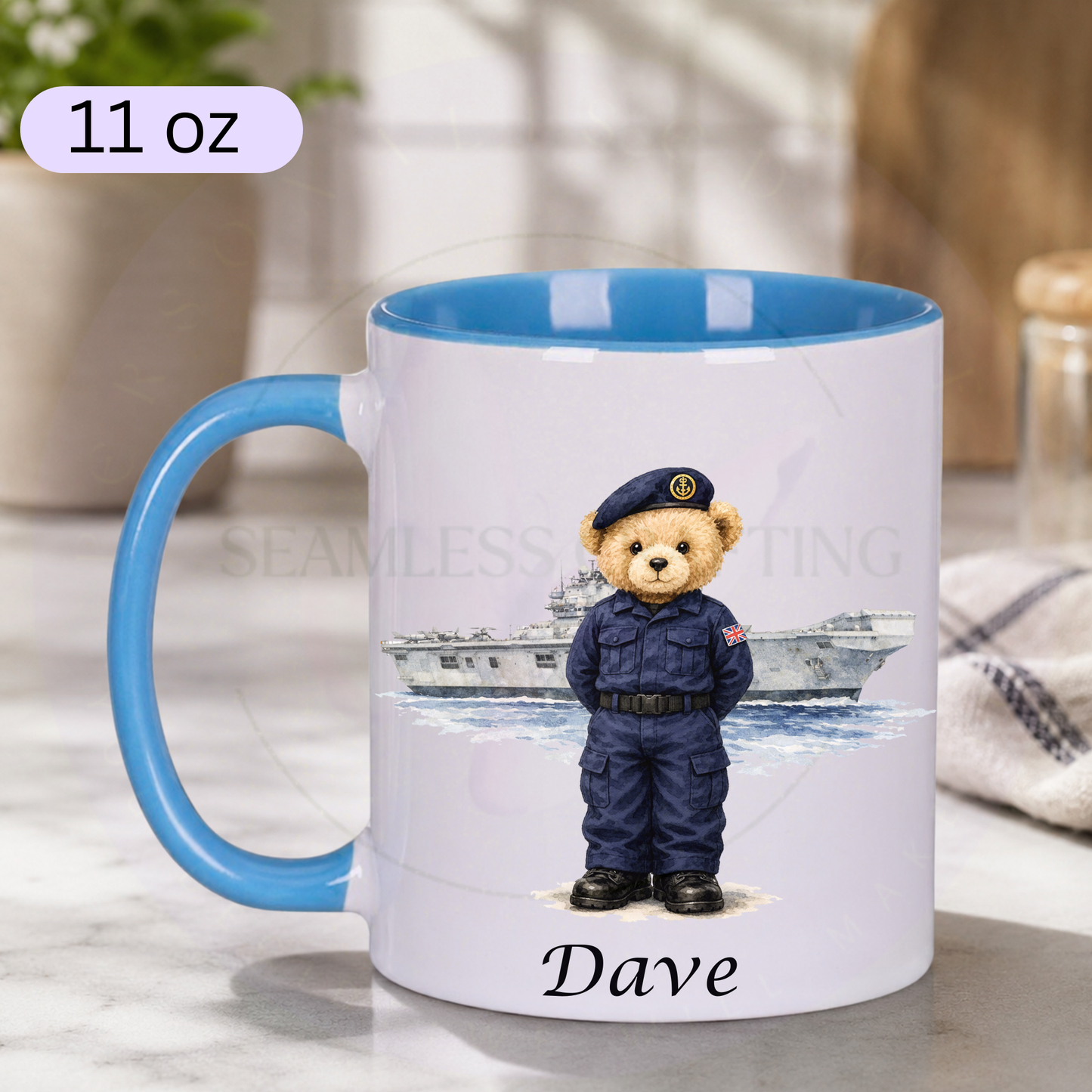 Personalised Royal Navy bear mug with carrier ship background and custom name on 11 oz blue handle ceramic mug