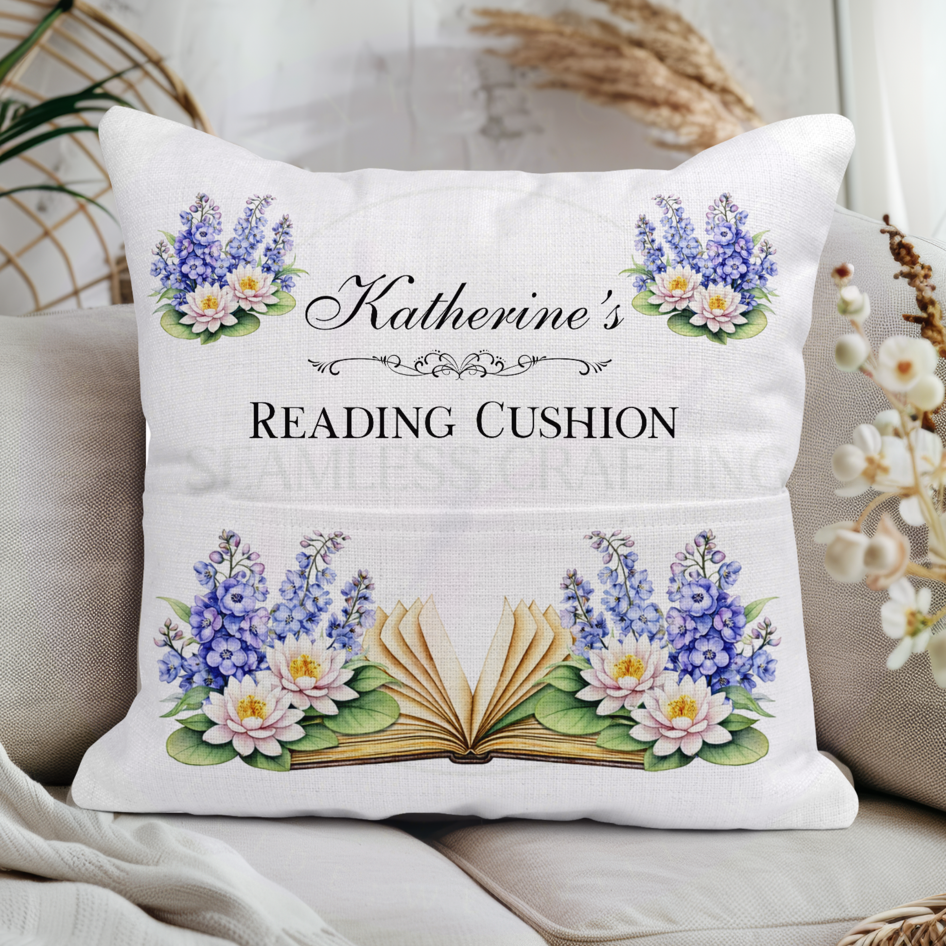 Close‑up of personalised name on July birth flower book pillow – Larkspur and Water Lily artwork