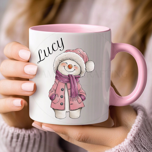 Personalised pink-handle Christmas mug with the name Lucy and a pink snowman design