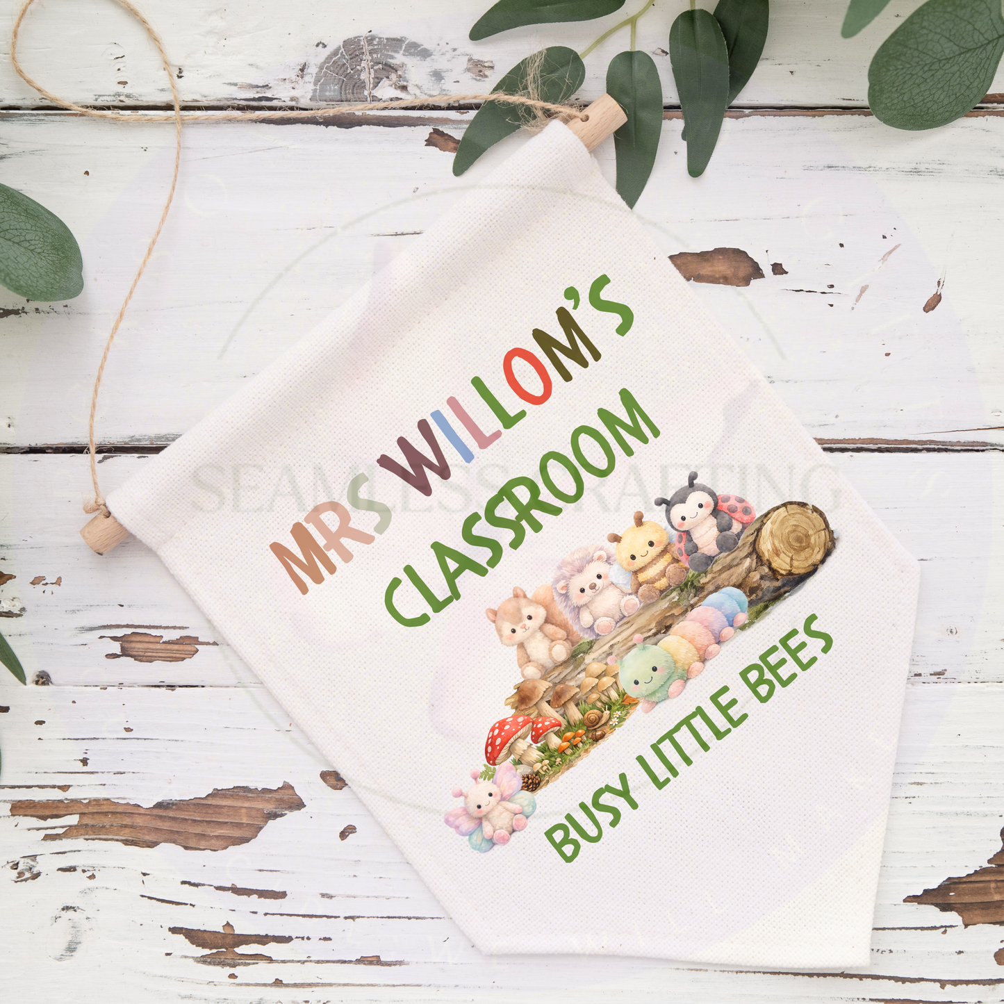 Flat lay of personalised classroom wall hanging banner with teacher name and woodland animal design