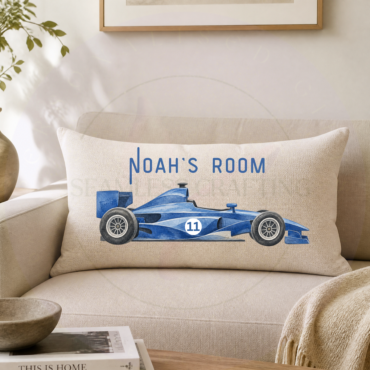 Personalised motorsport cushion with blue racing car and custom Noah's Room wording