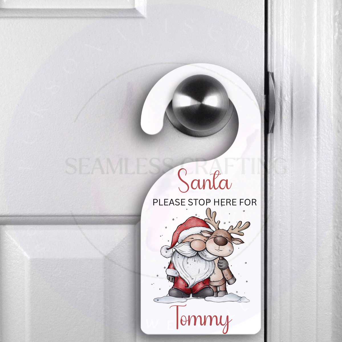 Personalised Santa Stop Here acrylic door hanger with Santa, reindeer and custom name Tommy on white door