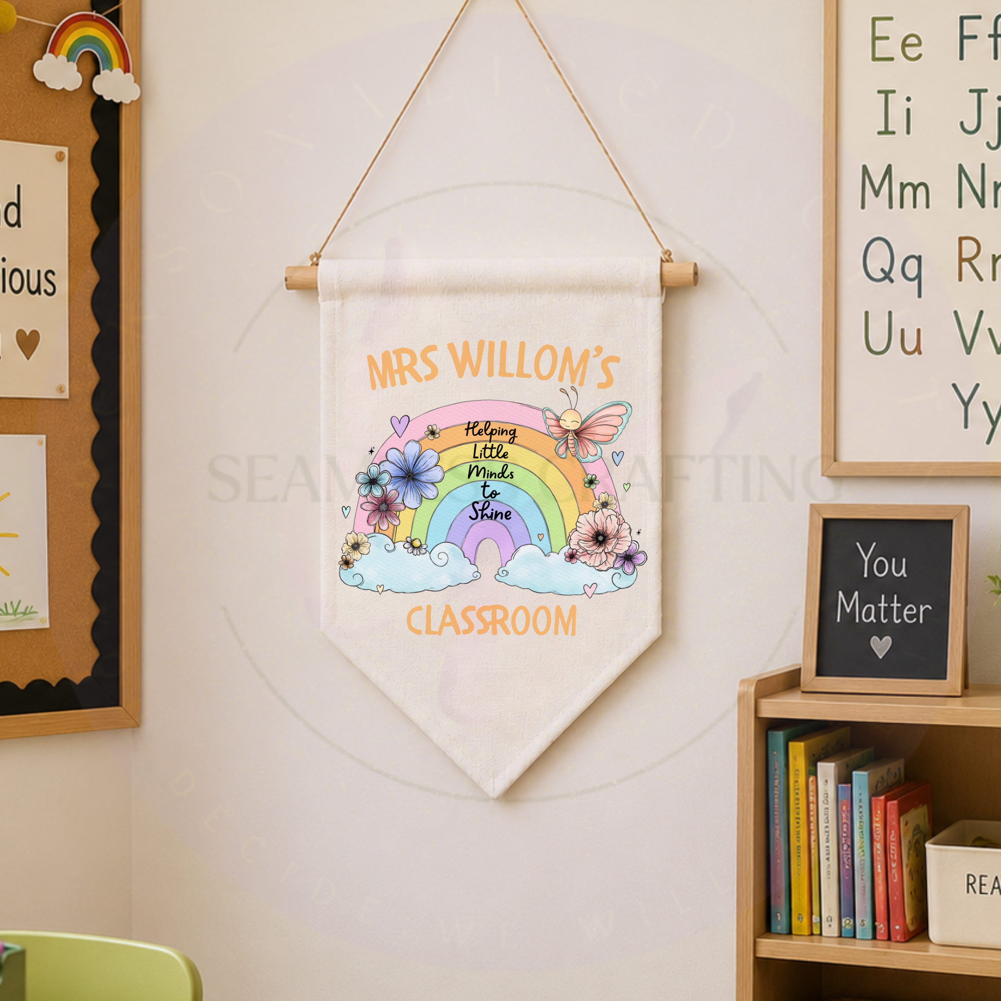 Personalised classroom wall hanging in a school setting with teacher name, woodland animals and nursery theme.