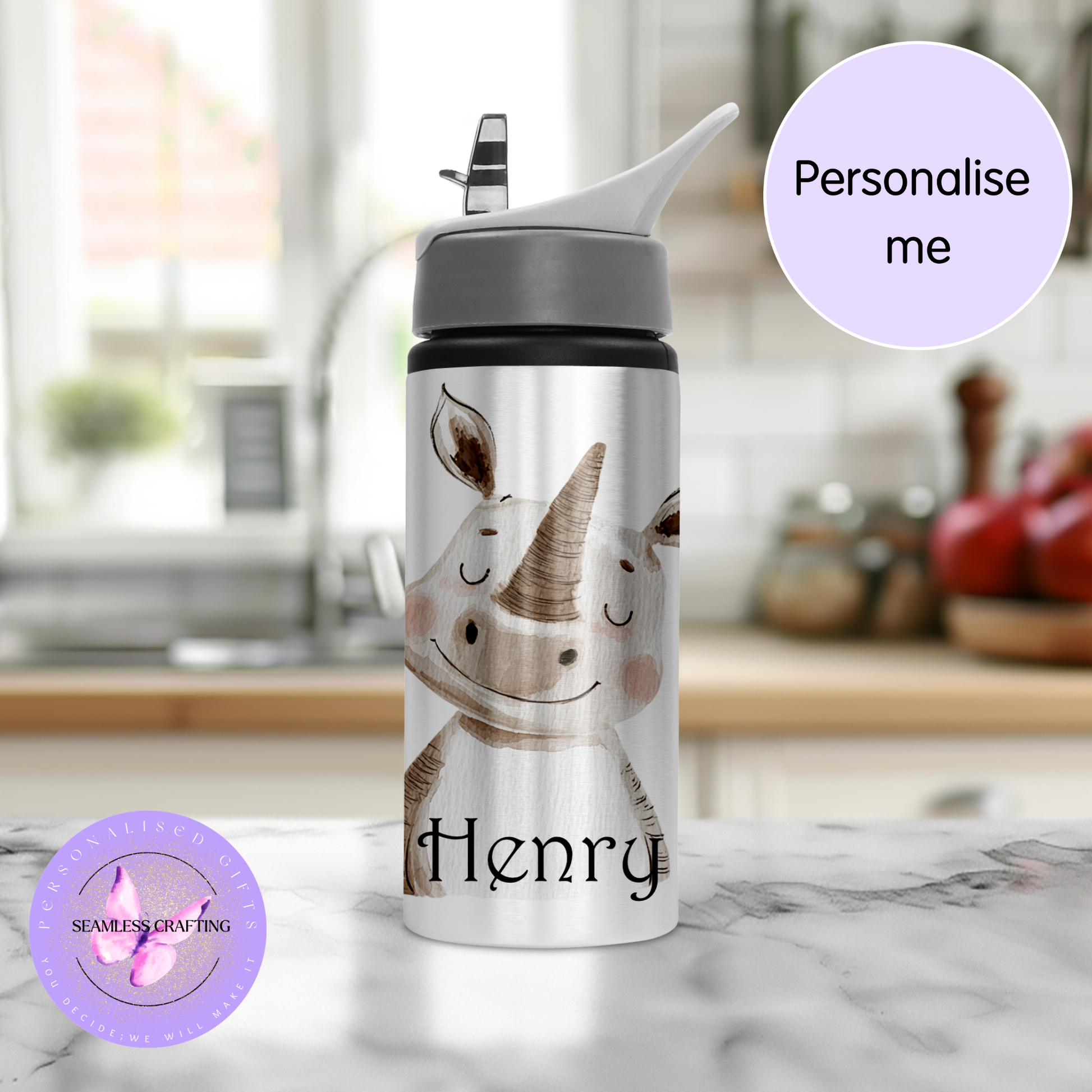 Water bottle with Rhino design and 'Henry' text, placed on a kitchen counter.