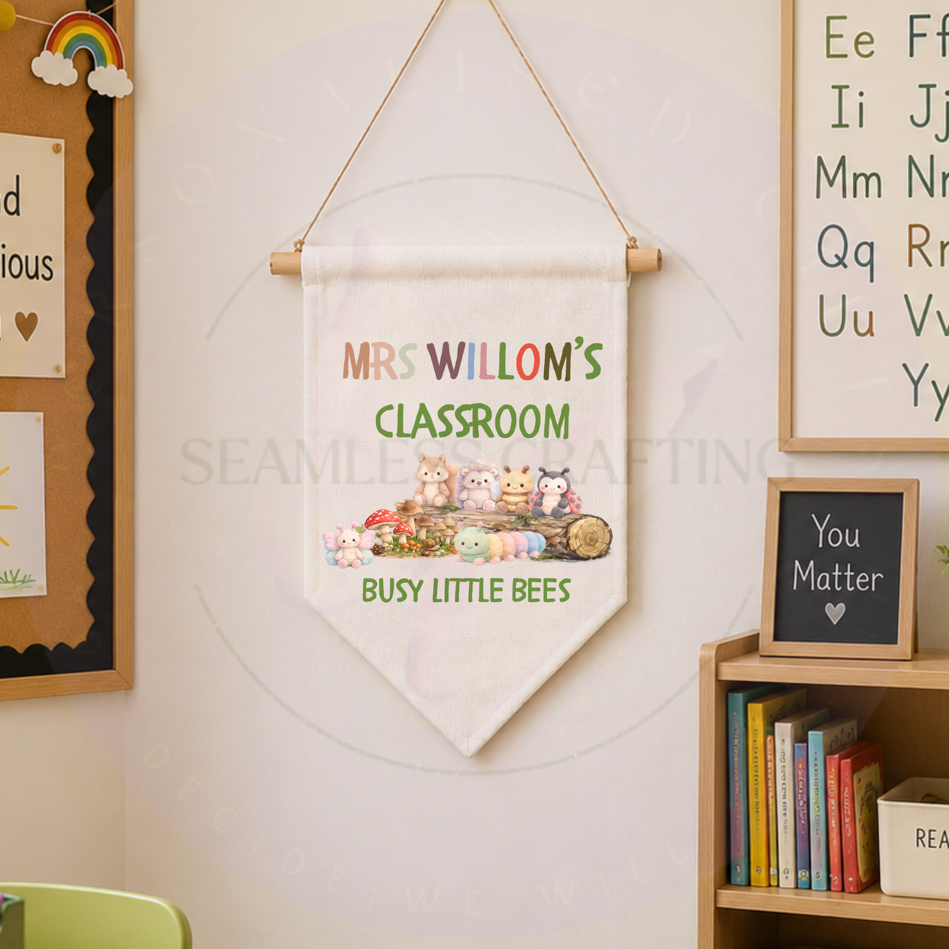 Personalised linen teacher classroom banner hanging on wall with woodland animals and busy little bees wording