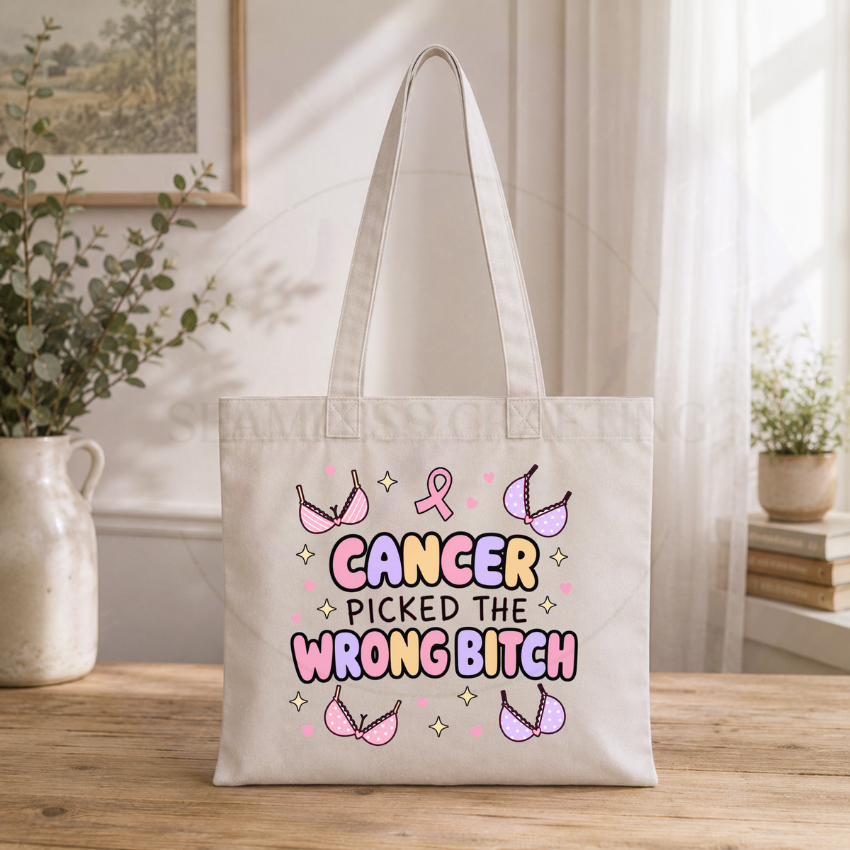 Natural cream breast cancer survivor tote bag displayed on a wooden table