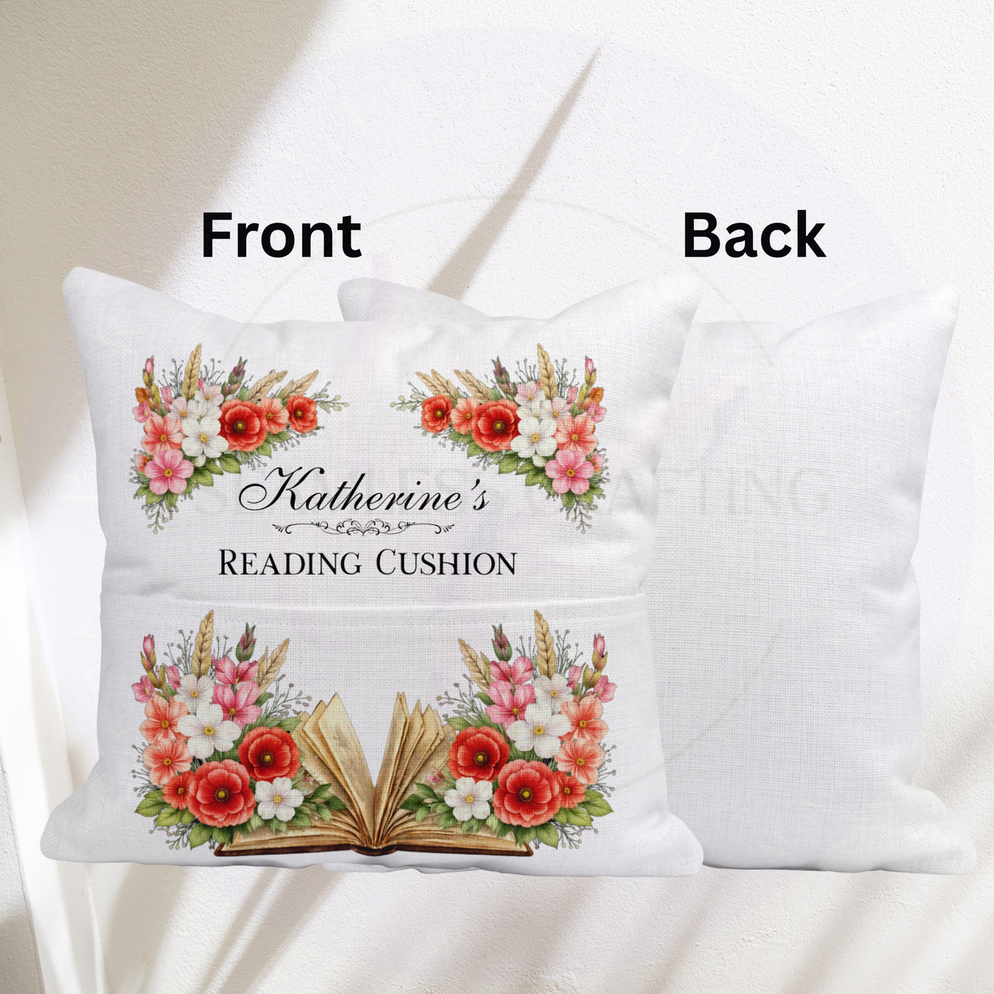 Close up of personalised reading cushion with August birth flowers poppy and gladiolus surrounding open book design — custom name cushion UK