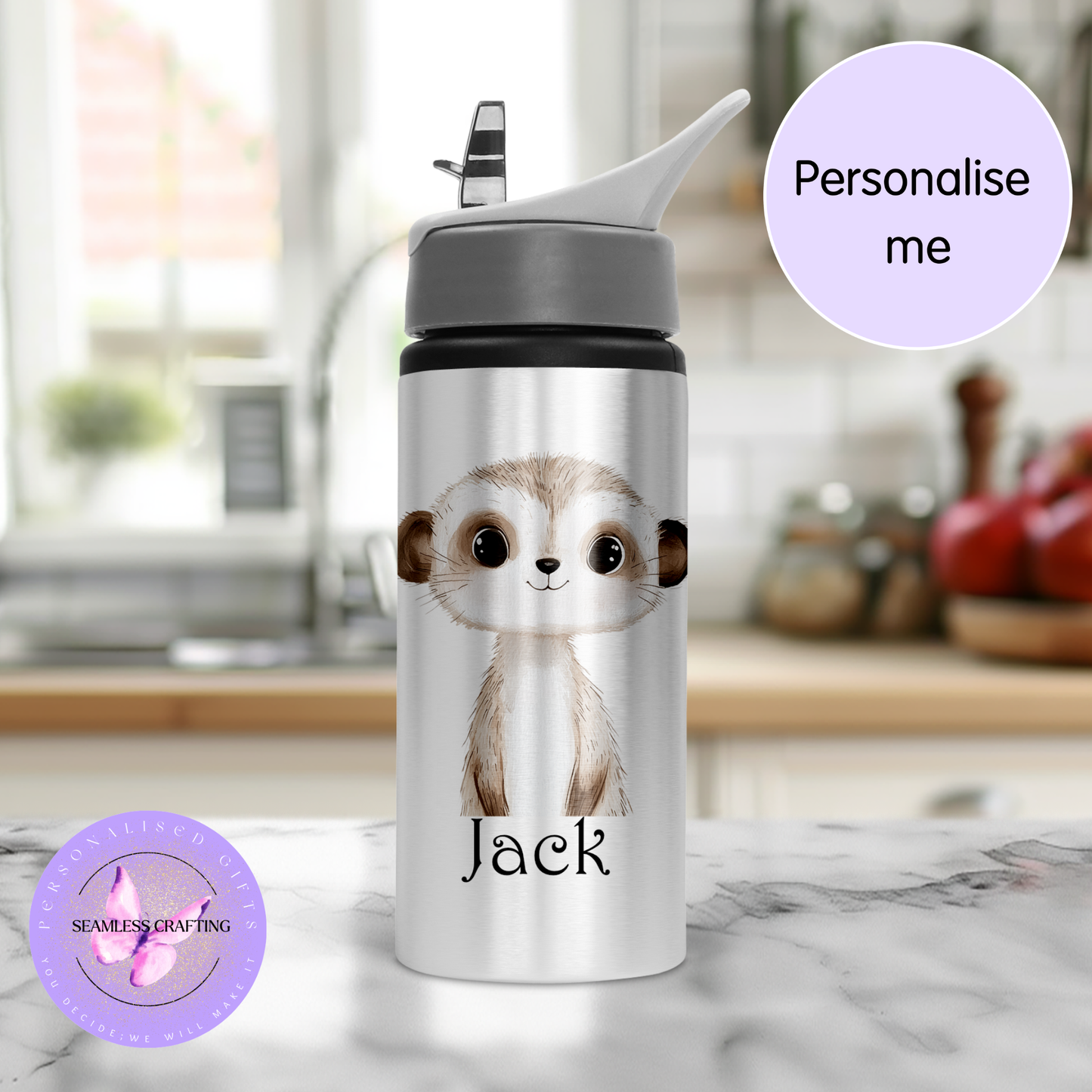 Personalized water bottle with a meerkat design and 'Jack' text, set against a kitchen background.