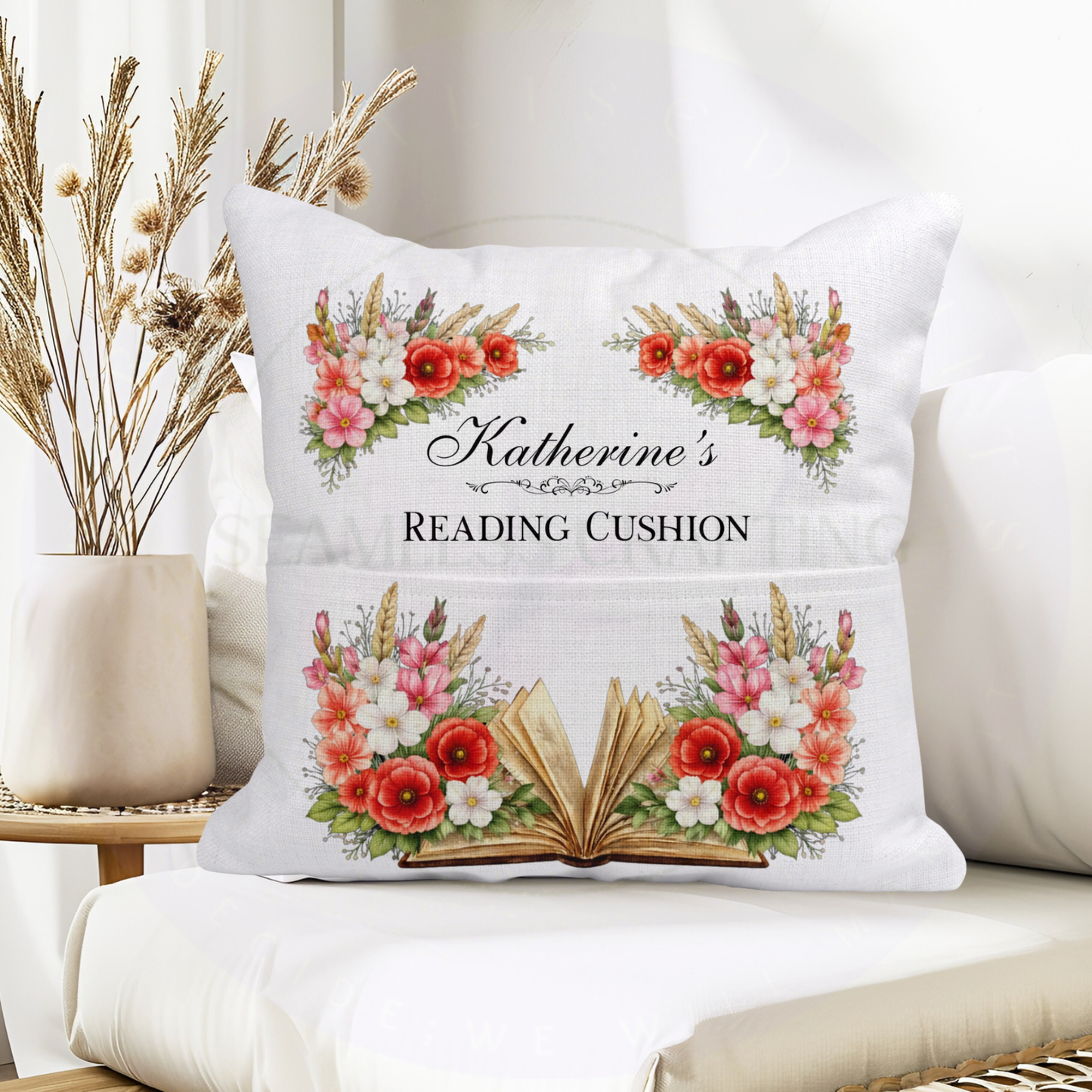 Personalised book lover cushion with August birth flower poppy and gladiolus design on wooden chair — unique birthday gift for readers