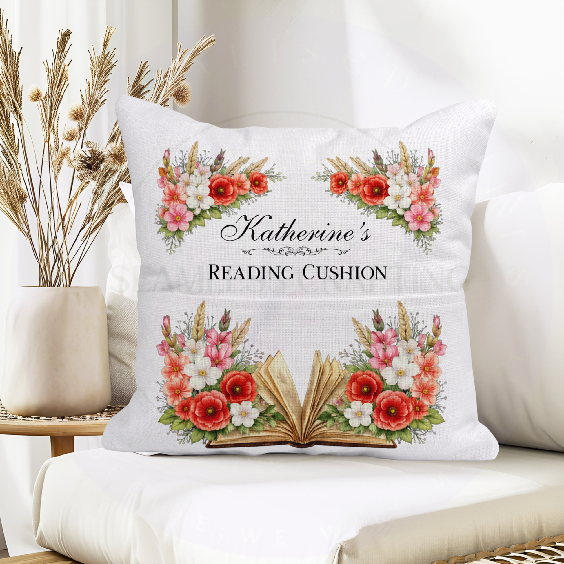 Personalised book lover cushion with August birth flower poppy and gladiolus design on wooden chair — unique birthday gift for readers