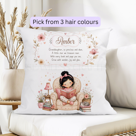 Personalised granddaughter reading cushion with book pocket, custom name and black hair girl