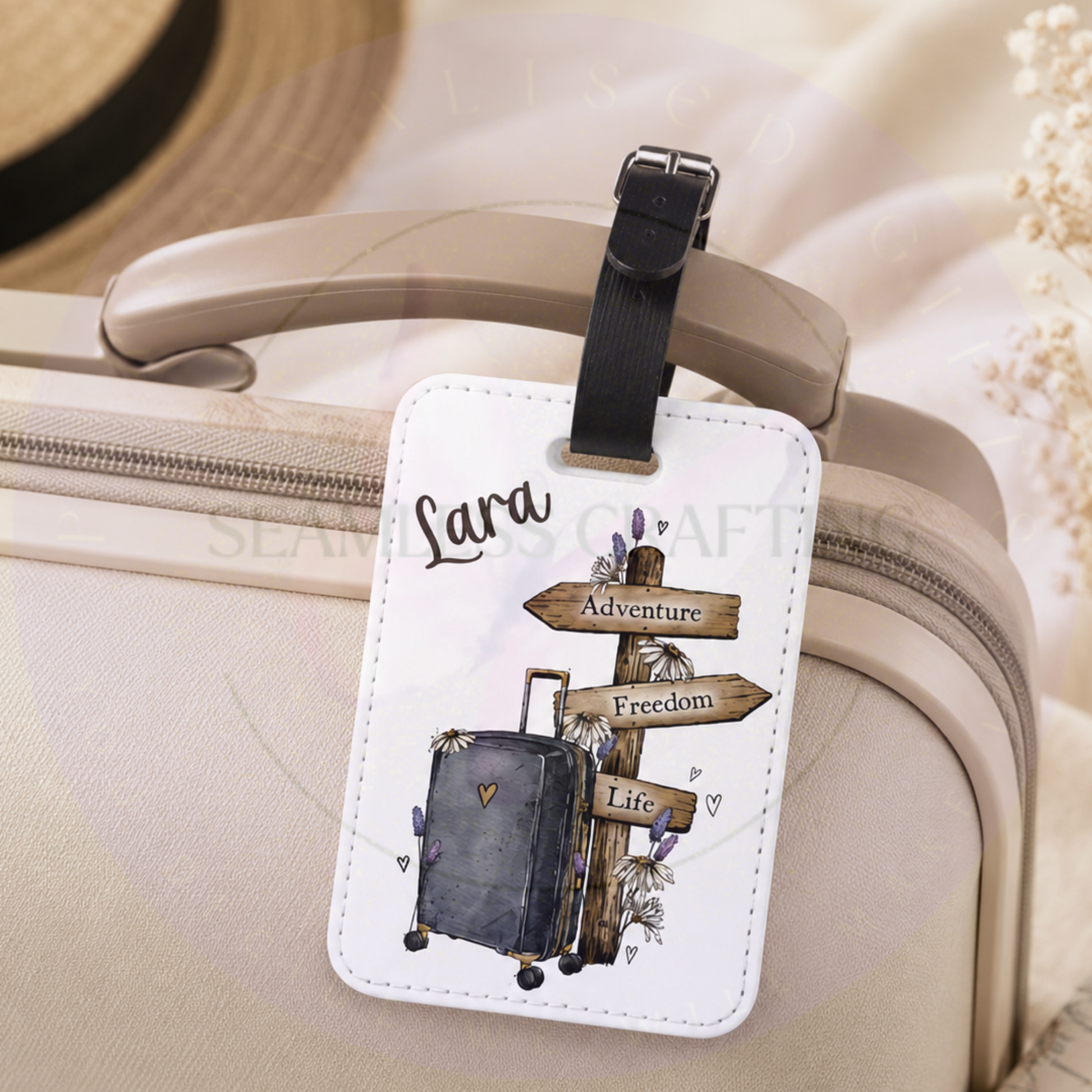 Close up of personalised luggage tag attached to a cream suitcase with travel signpost and suitcase illustration