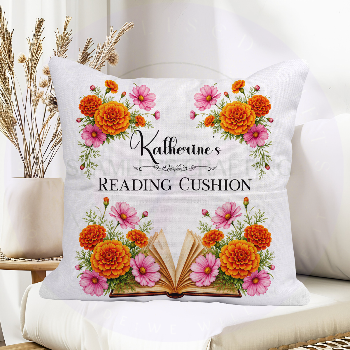 Floral October birthday reading cushion with book pocket displayed on a chair