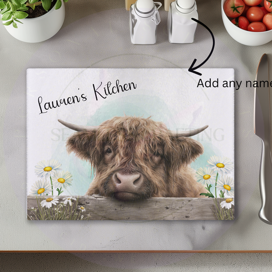 Personalised Highland cow glass chopping board with custom kitchen name